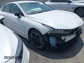 2023 Kia K5 GT-Line z VIN 5XXG64J25PG220733, wystawiony jako IAAI lot #42109640 z przebiegiem 30 917 mil mil oraz . Historia ofert i sprzedaży dostępna na DreamBid. Obrazek 1.