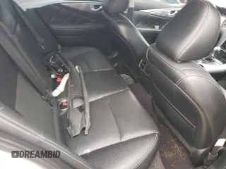 2014 Infiniti Q50 Premium with VIN JN1BV7AP1EM693338, listed as a Copart auction lot 58061545 with 97,290 mi miles and Salvage title. Bid and sale history available at DreamBid. Image 10.