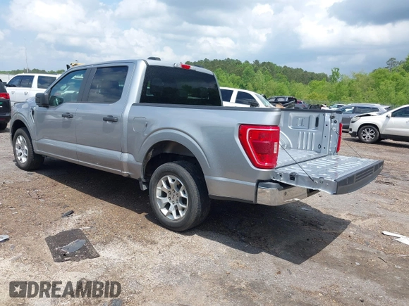 2023 Ford F-150 XL with VIN 1FTEW1C84PKD69454, listed as a IAAI auction lot 42087856 with 53,164 mi miles. Bid and sale history available at carsss.com. Image 3.