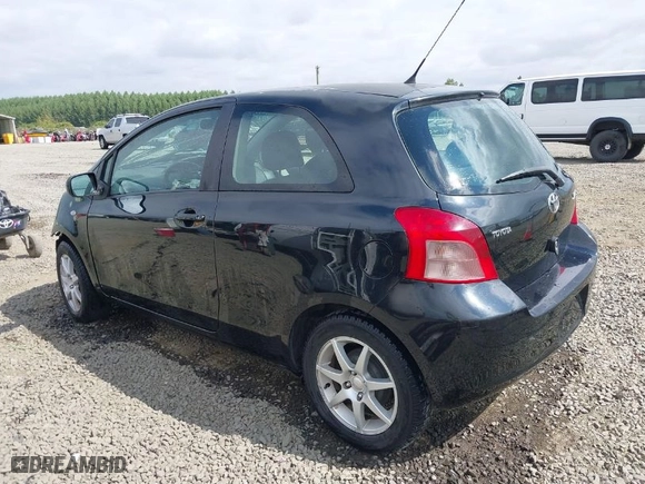 2007 Toyota Yaris with VIN JTDJT923975105026, listed as a IAAI auction lot 40091976 with 127,406 mi miles. Bid and sale history available at carsss.com. Image 3.