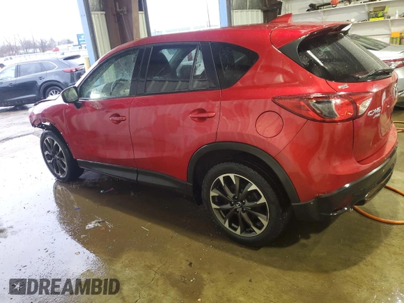 2016 Mazda CX-5 Grand Touring with VIN JM3KE4DY6G0714766, listed as a Copart auction lot 47468885 with 146,696 mi miles and Salvage Title. Bid and sale history available at carsss.com. Image 2.
