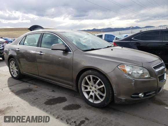 2012 Chevrolet Malibu LTZ with VIN 1G1ZG5E79CF280906, listed as a Copart auction lot 48709325 with 111,704 mi miles and Salvage Title. Bid and sale history available at DreamBid. Image 4.