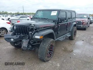 2022 Jeep Wrangler Unlimited Sport S z VIN 1C4HJXDG0NW133801, wystawiony jako IAAI lot #41908846 z przebiegiem 44 743 mil mil oraz . Historia ofert i sprzedaży dostępna na DreamBid. Obrazek 17.