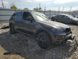 2012 BMW X5 35i with VIN 5UXZV4C54CL985119, listed as a Copart auction lot 56856735 with Not provided miles and Salvage title. Bid and sale history available at DreamBid. Image 4.