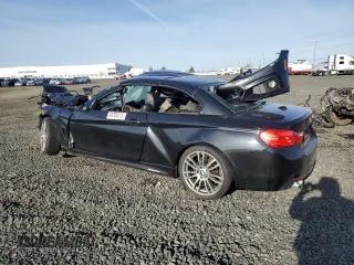 2015 BMW 4 Series 428i with VIN WBA3V7C59FP772153, listed as a Copart auction lot 49709215 with Not Provided miles and Salvage Title. Bid and sale history available at carsss.com. Image 2.