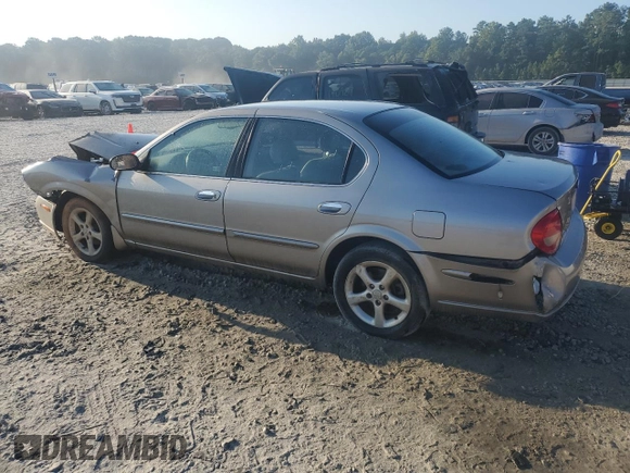2001 Nissan Maxima GXE z VIN JN1CA31D11T828767, wystawiony jako Copart lot #69504024 z przebiegiem 177 431 mil mil oraz Szkoda całkowita • Salvage title. Historia ofert i sprzedaży dostępna na DreamBid. Obrazek 2.