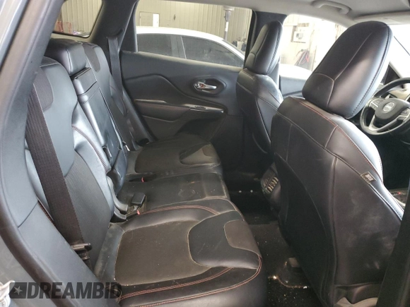 2014 Jeep Cherokee Trailhawk z VIN 1C4PJMBB0EW309277, wystawiony jako Copart lot #52370565 z przebiegiem 148 924 mil mil oraz Czysty tytuł • Clean title. Historia ofert i sprzedaży dostępna na DreamBid. Obrazek 11.