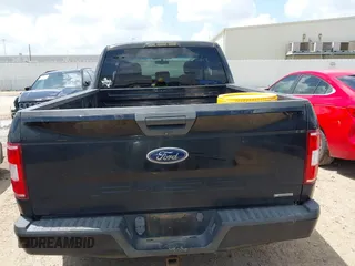 2018 Ford F-150 XL with VIN 1FTEX1CP3JKC39709, listed as a IAAI auction lot 42507999 with 163,478 mi miles and . Bid and sale history available at DreamBid. Image 16.