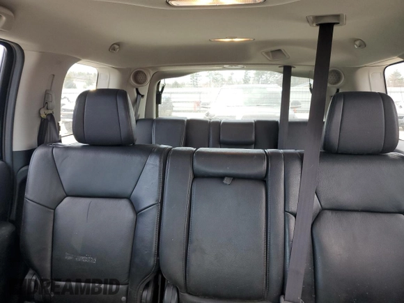 2013 Honda Pilot Touring z VIN 5FNYF4H97DB007336, wystawiony jako Copart lot #52785595 z przebiegiem 141 104 mil mil oraz Szkoda całkowita • Salvage title. Historia ofert i sprzedaży dostępna na DreamBid. Obrazek 10.