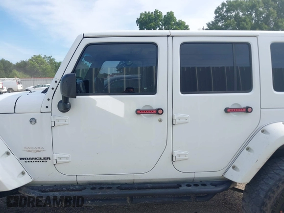2012 Jeep Wrangler Unlimited Sahara with VIN 1C4BJWEG1CL186407, listed as a IAAI auction lot 42593848 with 178,354 mi miles and . Bid and sale history available at DreamBid. Image 14.