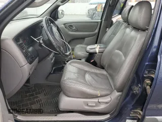 2002 Mazda Tribute LX with VIN 4F2YU09132KM45424, listed as a Copart auction lot 47778905 with 196,982 mi miles and Salvage Title. Bid and sale history available at carsss.com. Image 7.