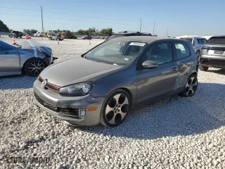 2011 Volkswagen GTI w/Sunroof with VIN WVWEV7AJXBW074579, listed as a Copart auction lot 70604034 with 117,760 mi miles and Salvage Title. Bid and sale history available at carsss.com. Image 1.