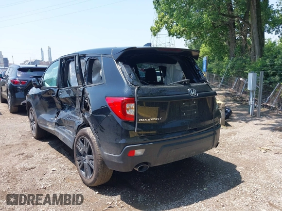 2021 Honda Passport Sport with VIN 5FNYF8H24MB043219, listed as a IAAI auction lot 42461003 with 38,800 mi miles and . Bid and sale history available at DreamBid. Image 3.