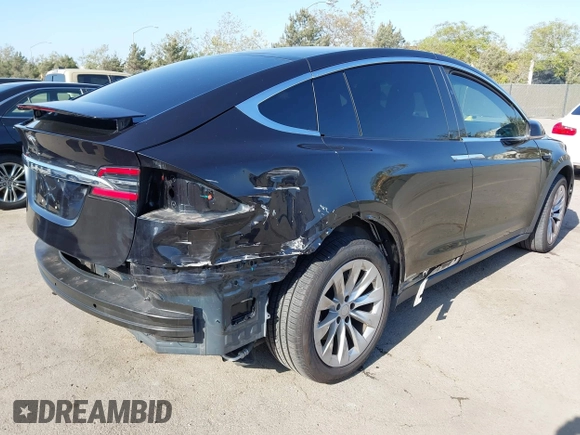 2017 Tesla Model X 90D with VIN 5YJXCBE25HF044617, listed as a IAAI auction lot 42096323 with 115,077 mi miles and . Bid and sale history available at DreamBid. Image 6.