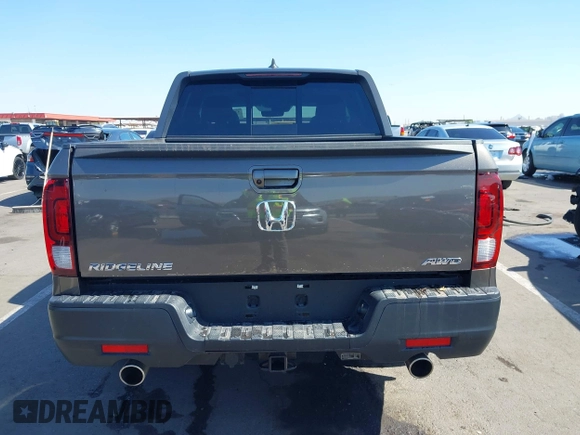 2022 Honda Ridgeline RTL with VIN 5FPYK3F58NB007618, listed as a IAAI auction lot 42258443 with 14,036 mi miles and . Bid and sale history available at DreamBid. Image 17.