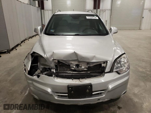 2012 Chevrolet Captiva Sport LTZ with VIN 3GNFL4E5XCS609095, listed as a Copart auction lot 77334734 with 163,078 mi miles and Salvage Title. Bid and sale history available at DreamBid. Image 5.