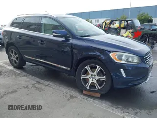 2014 Volvo XC60 R-Design Premier Plus with VIN YV4902DZ9E2501974, listed as a IAAI auction lot 41557277 with 57,932 mi miles and . Bid and sale history available at DreamBid. Image 1.