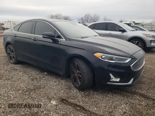 2020 Ford Fusion Titanium with VIN 3FA6P0K98LR175611, listed as a Copart auction lot 46070785 with 107,909 mi miles and Salvage title. Bid and sale history available at DreamBid. Image 4.