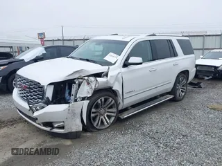 2019 GMC Yukon Denali with VIN 1GKS1CKJ7KR364240, listed as a IAAI auction lot 41645374 with 104,956 mi miles. Bid and sale history available at carsss.com. Image 6.