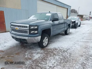 2014 Chevrolet Silverado 1500 LT with VIN 1GCVKREH3EZ301402, listed as a IAAI auction lot 41545630 with 177,904 mi miles and . Bid and sale history available at DreamBid. Image 2.