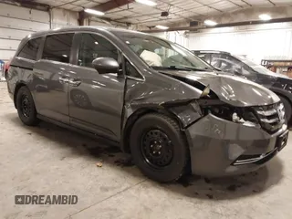 2015 Honda Odyssey EX with VIN 5FNRL5H45FB008236, listed as a IAAI auction lot 41830349 with 148,792 mi miles. Bid and sale history available at carsss.com. Image 1.