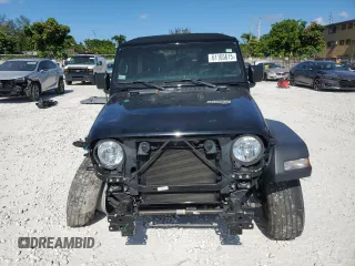 2022 Jeep Wrangler Unlimited Willys with VIN 1C4HJXDN2NW128081, listed as a Copart auction lot 61165615 with 28,525 mi miles and Salvage title. Bid and sale history available at DreamBid. Image 5.