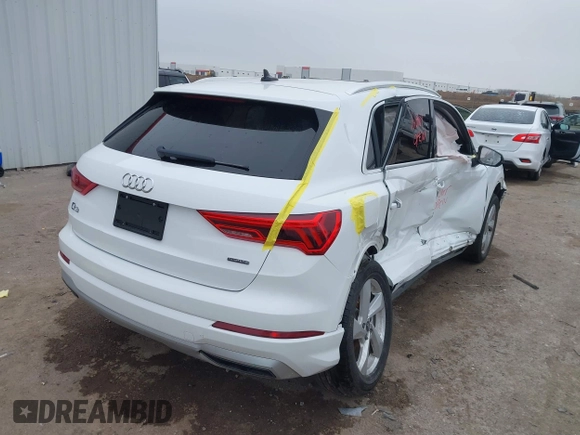 2021 Audi Q3 Premium with VIN WA1AUCF35M1089733, listed as a IAAI auction lot 41506186 with 69,211 mi miles and . Bid and sale history available at DreamBid. Image 4.
