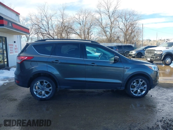 2015 Ford Escape SE with VIN 1FMCU9G98FUA70885, listed as a IAAI auction lot 41608240 with 54,802 mi miles. Bid and sale history available at carsss.com. Image 13.