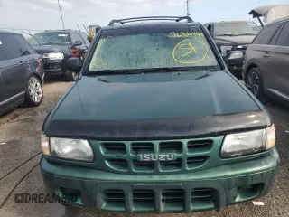 2002 Isuzu Rodeo S z VIN 4S2CK58W024333487, wystawiony jako Copart lot #76361854 z przebiegiem Nie podano mil oraz Nie do naprawy. Historia ofert i sprzedaży dostępna na DreamBid. Obrazek 5.