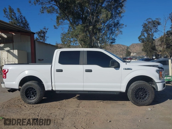 2020 Ford F-150 XL with VIN 1FTEW1CP7LKD24719, listed as a IAAI auction lot 41670273 with 57,188 mi miles. Bid and sale history available at carsss.com. Image 14.