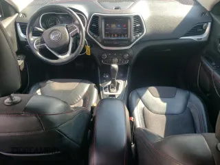 2014 Jeep Cherokee Trailhawk with VIN 1C4PJMBS5EW185510, listed as a Copart auction lot 55780005 with 130,358 mi miles and Clean title. Bid and sale history available at DreamBid. Image 8.