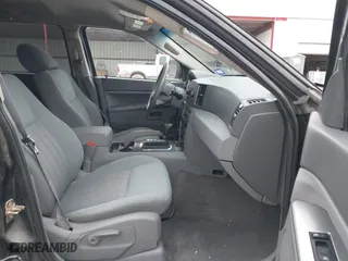 2006 Jeep Grand Cherokee Laredo with VIN 1J4GS48KX6C322538, listed as a IAAI auction lot 41282093 with 176,901 mi miles. Bid and sale history available at carsss.com. Image 5.