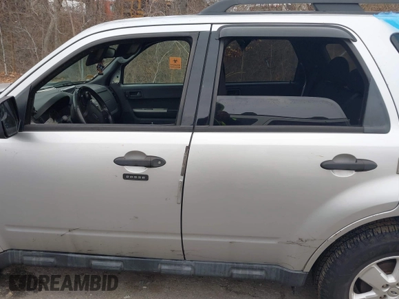 2012 Ford Escape XLT z VIN 1FMCU9DG4CKC57695, wystawiony jako IAAI lot #41716974 z przebiegiem 143 860 mil mil oraz . Historia ofert i sprzedaży dostępna na DreamBid. Obrazek 13.