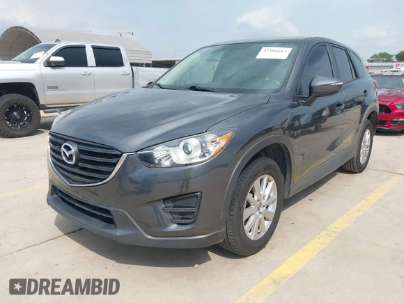2016 Mazda CX-5 Sport with VIN JM3KE4BY8G0921243, listed as a IAAI auction lot 42102663 with 111,960 mi miles and . Bid and sale history available at DreamBid. Image 19.