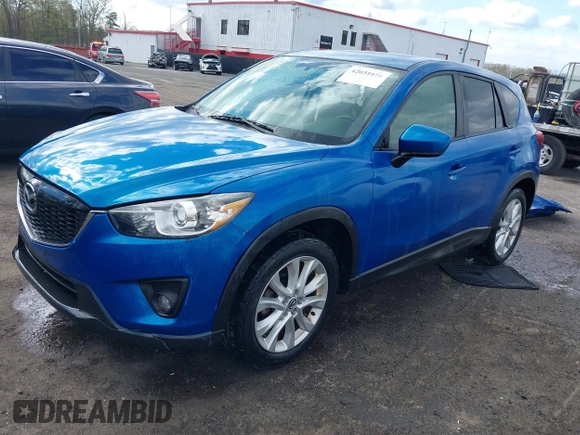 2013 Mazda CX-5 Grand Touring with VIN JM3KE4DE4D0123837, listed as a IAAI auction lot 42031074 with 121,818 mi miles. Bid and sale history available at carsss.com. Image 18.