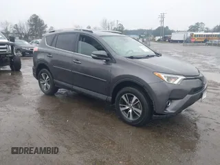 2018 Toyota RAV4 XLE with VIN 2T3RFREV5JW798328, listed as a IAAI auction lot 41868104 with 61,076 mi miles. Bid and sale history available at carsss.com. Image 1.