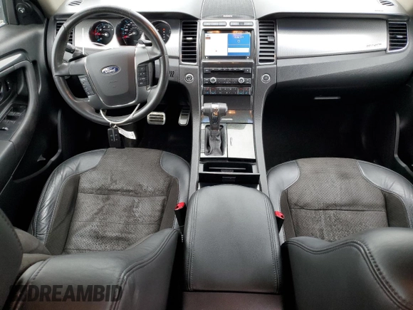 2012 Ford Taurus SHO with VIN 1FAHP2KT2CG141879, listed as a Copart auction lot 56558365 with 105,230 mi miles and Salvage title. Bid and sale history available at DreamBid. Image 8.
