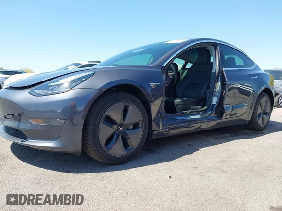 2019 Tesla Model 3 Long Range with VIN 5YJ3E1EB9KF386047, listed as a IAAI auction lot 42215362 with 41,246 mi miles and . Bid and sale history available at DreamBid. Image 2.