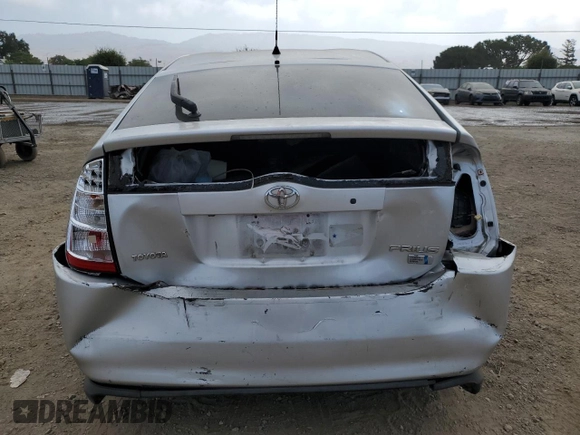 2006 Toyota Prius z VIN JTDKB20U167071838, wystawiony jako Copart lot #59407885 z przebiegiem 234 172 mil mil oraz Szkoda całkowita • Salvage title. Historia ofert i sprzedaży dostępna na DreamBid. Obrazek 6.