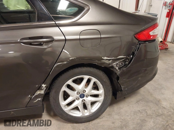 2016 Ford Fusion SE with VIN 1FA6P0HDXG5103054, listed as a IAAI auction lot 41823043 with 71,303 mi miles and . Bid and sale history available at DreamBid. Image 6.