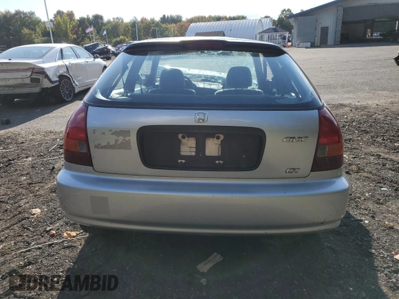 1998 Honda Civic CX with VIN 2HGEJ6427WH121499, listed as a Copart auction lot 73657704 with 101,999 mi miles and Salvage Title. Bid and sale history available at DreamBid. Image 6.