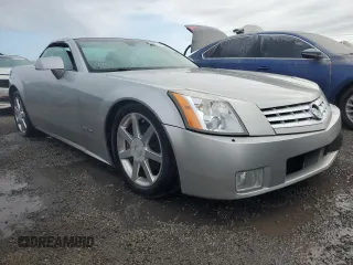 2004 Cadillac XLR z VIN 1G6YV34A545602056, wystawiony jako Copart lot #66506514 z przebiegiem Nie podano mil oraz Nie do naprawy. Historia ofert i sprzedaży dostępna na DreamBid. Obrazek 4.