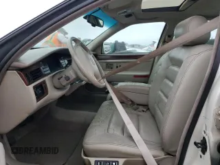 1995 Cadillac Concours z VIN 1G6KF52Y3SU270555, wystawiony jako Copart lot #76318254 z przebiegiem Nie podano mil oraz Szkody całkowita. Historia ofert i sprzedaży dostępna na DreamBid. Obrazek 7.