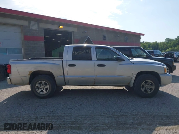 2006 Dodge Dakota SLT with VIN 1D7HW48N56S503261, listed as a IAAI auction lot 42562979 with 200,676 mi miles and . Bid and sale history available at DreamBid. Image 13.