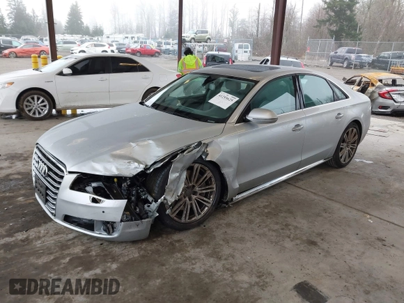 2013 Audi A8 4.0L с VIN WAUA2AFD5DN017770, выставлен на аукционе IAAI как лот 41255625 с пробегом 115 993 миль миль и . История ставок и продаж доступна на DreamBid. Изображение 2.