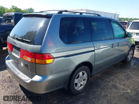 2002 Honda Odyssey EX z VIN 5FNRL18632B009809, wystawiony jako IAAI lot #42269763 z przebiegiem 264 203 mil mil oraz . Historia ofert i sprzedaży dostępna na DreamBid. Obrazek 4.