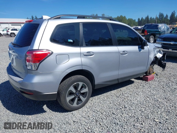 2018 Subaru Forester with VIN JF2SJABC1JH460789, listed as a IAAI auction lot 42631854 with 86,215 mi miles and . Bid and sale history available at DreamBid. Image 4.