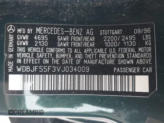 1997 Mercedes-Benz E-Class with VIN WDBJF55F3VJ034009, listed as a IAAI auction lot 41710225 with 239,673 mi miles. Bid and sale history available at carsss.com. Image 9.