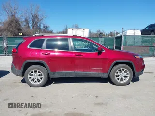 2015 Jeep Cherokee Latitude with VIN 1C4PJMCB6FW714656, listed as a IAAI auction lot 41887261 with 131,600 mi miles and . Bid and sale history available at carsss.com. Image 13.