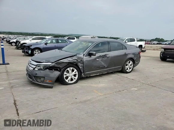 2012 Ford Fusion SE z VIN 3FAHP0HAXCR436084, wystawiony jako Copart lot #57390385 z przebiegiem 88 645 mil mil oraz Szkoda całkowita • Salvage title. Historia ofert i sprzedaży dostępna na DreamBid. Obrazek 13.